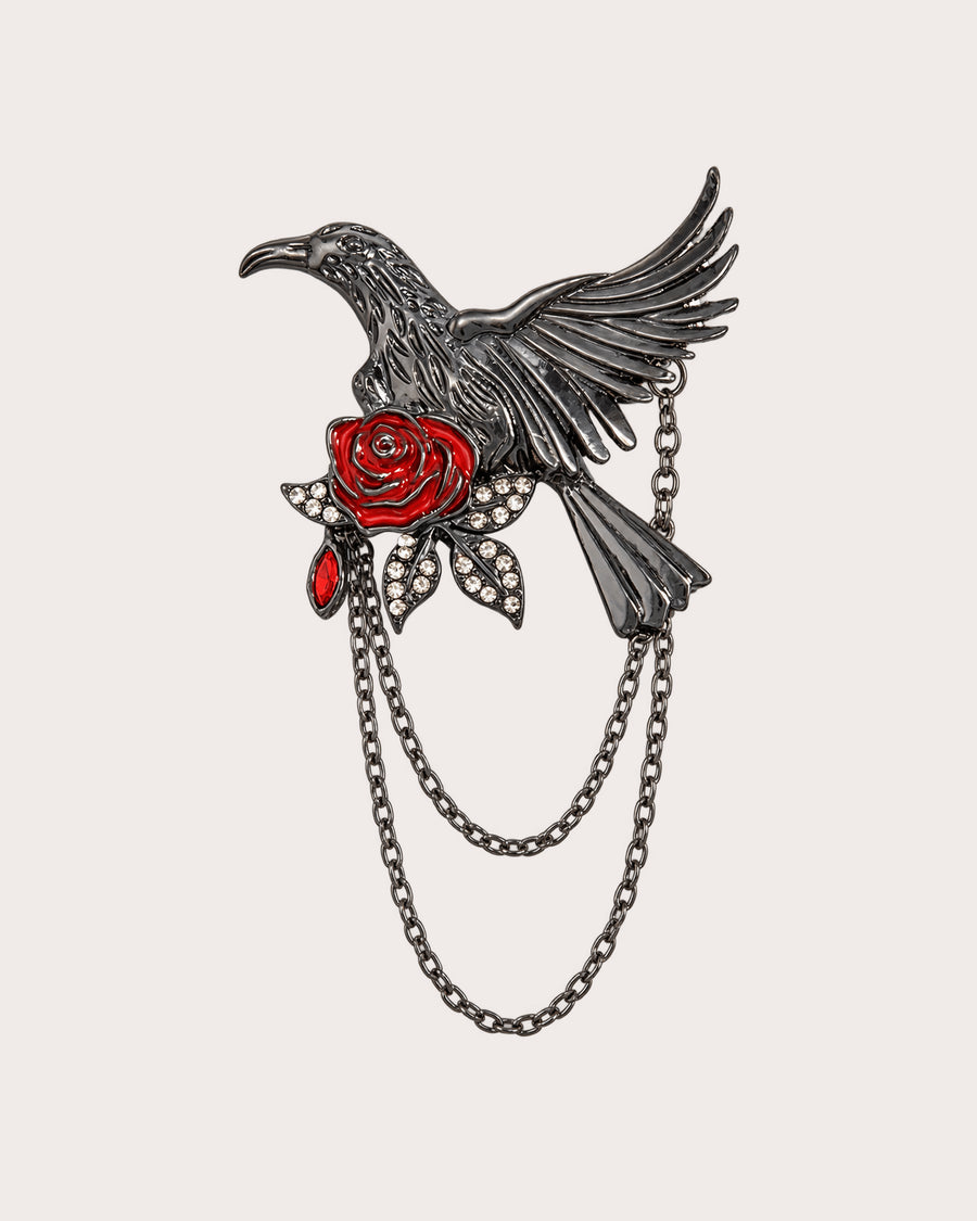 Noctra gunmetal-tone bird and red rose brooch with four stone leaves and two draped chains