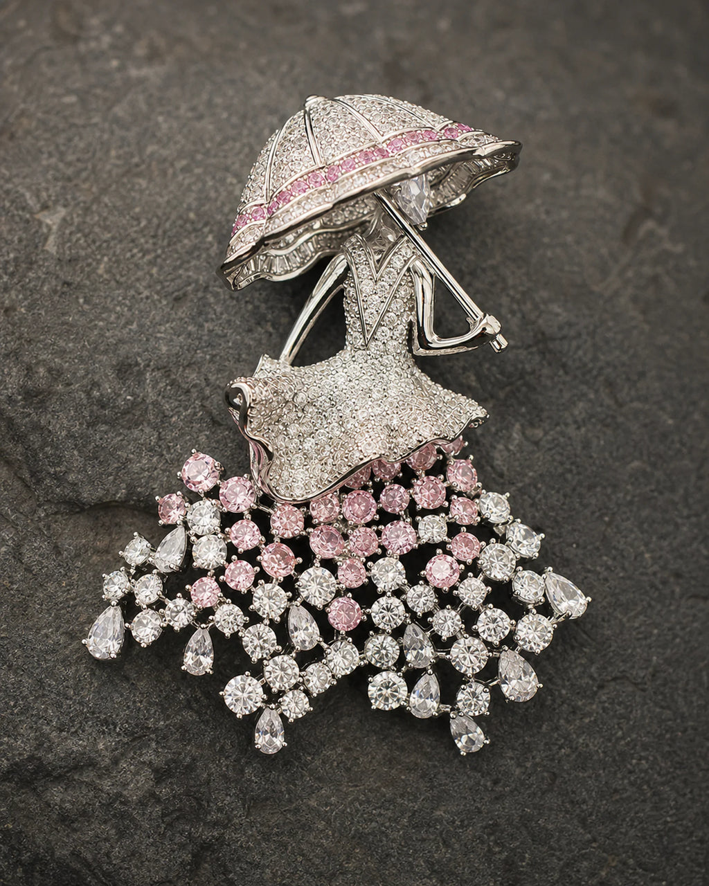 Macro view of Noora's silver umbrella, pink and clear crystal construction