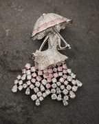 Macro view of Noora's silver umbrella, pink and clear crystal construction