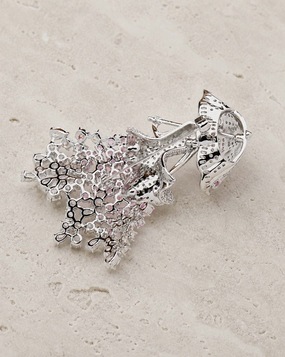 Rear view of Noora showing the pin-back, open settings and umbrella construction