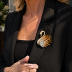 Odette Swan Crystal Brooch worn on camel coat