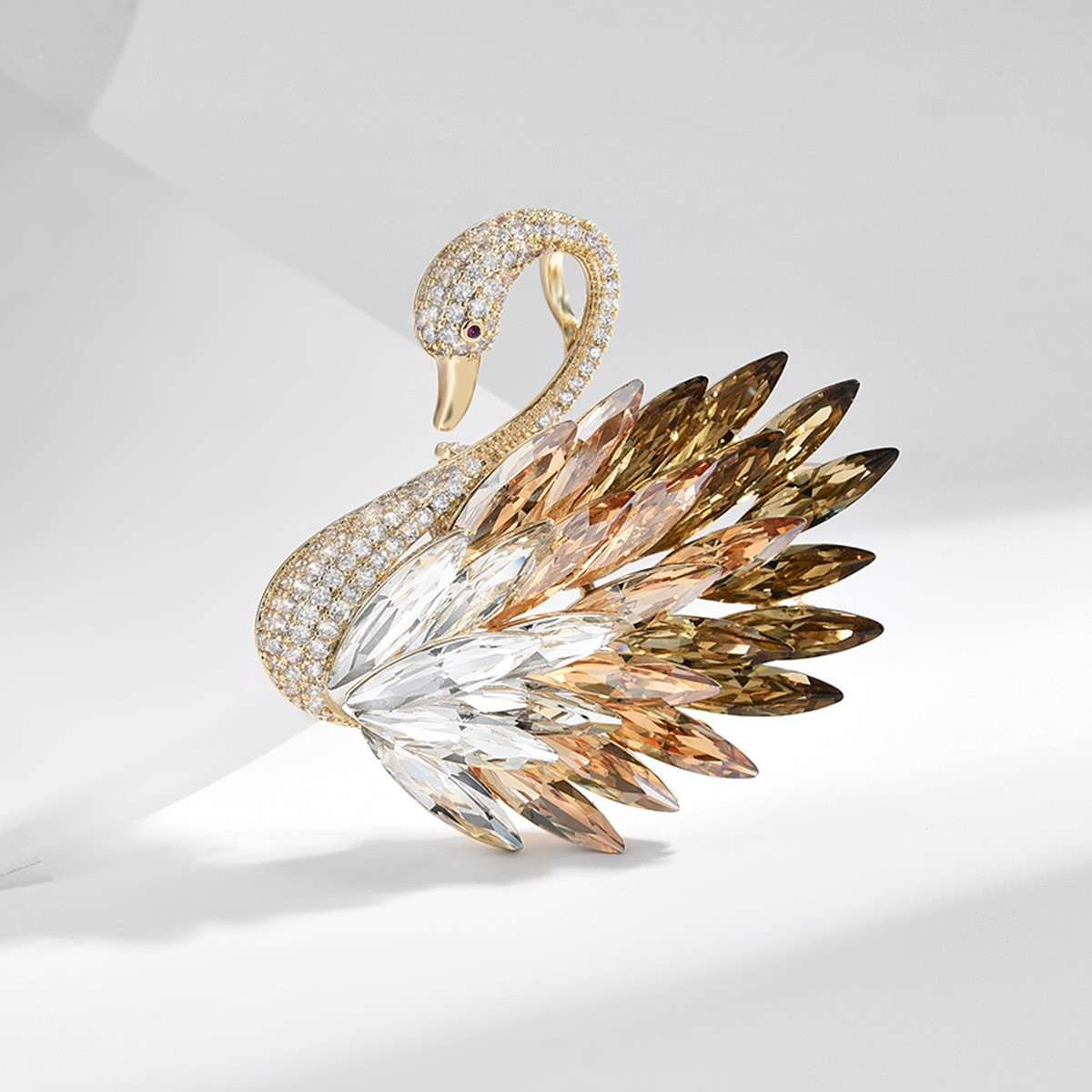 Odette Swan Crystal Brooch on brown satin