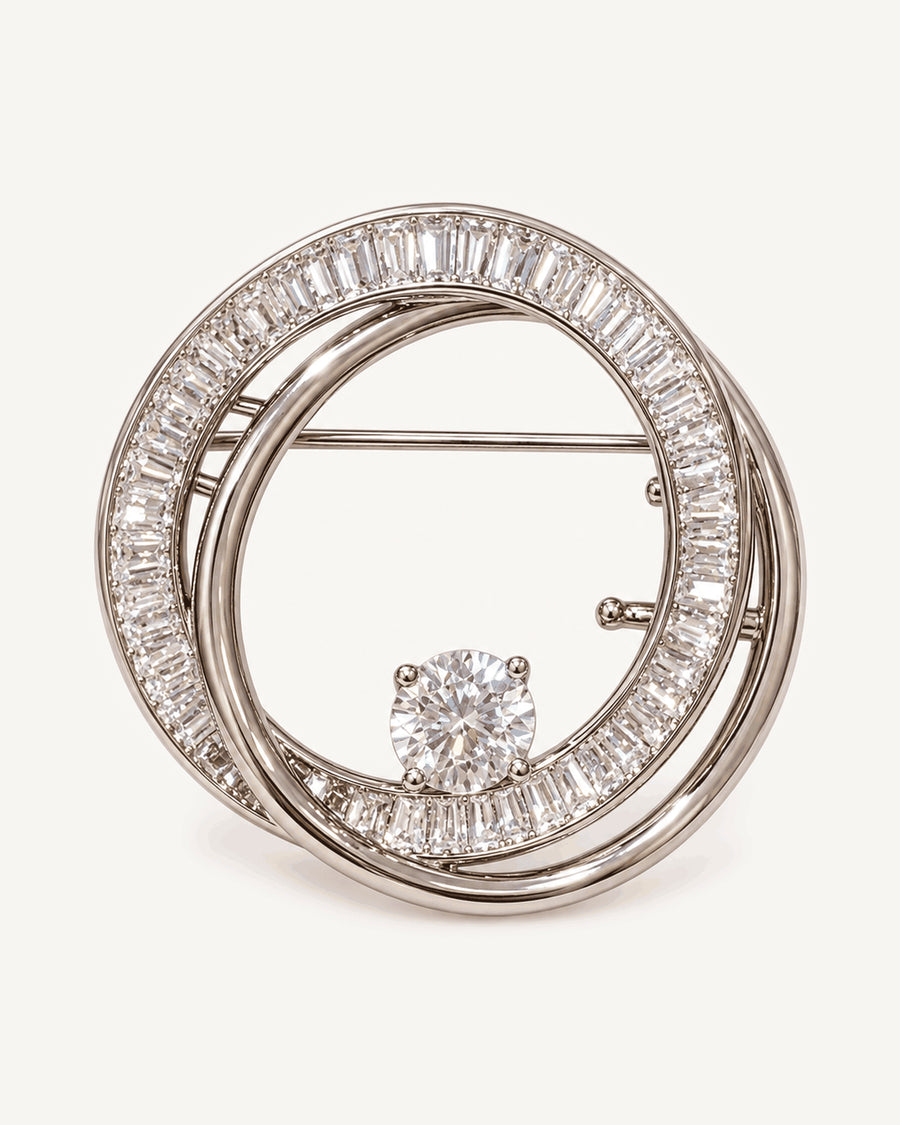 Oona Baguette Zircon Double-Loop Brooch shown complete on a warm plain background.