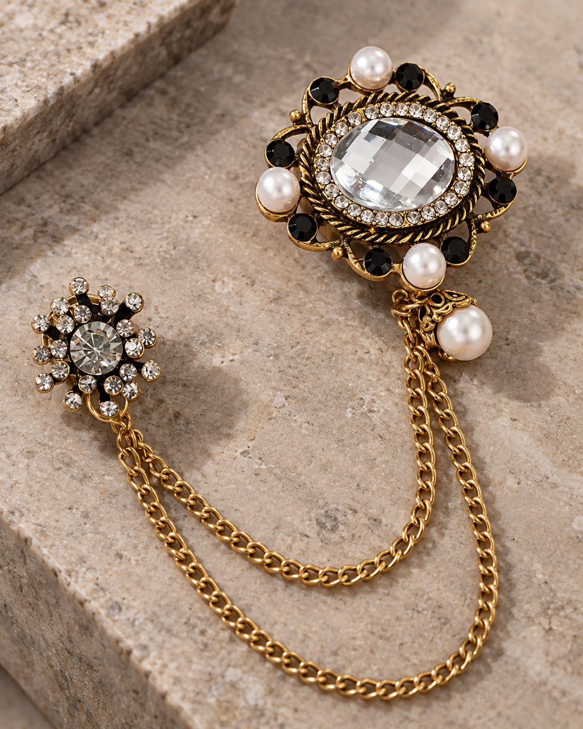 Ova Oval Beaded Lapel Chain Brooch in gold-tone finish; motif and chain detail