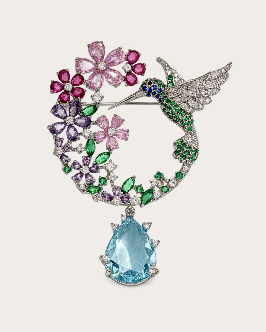 Pihla silver-tone hummingbird floral wreath brooch with colorful flowers and aqua drop