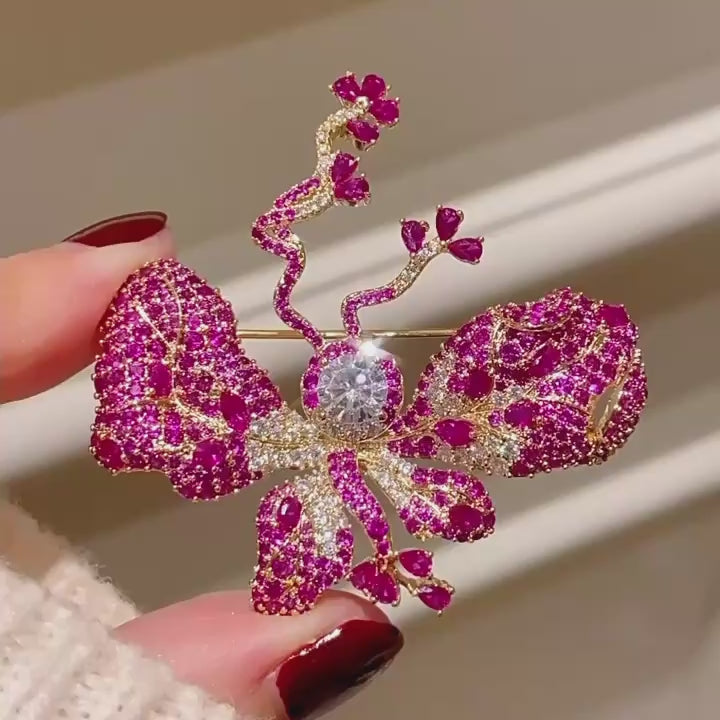 Anni Rose Pink Butterfly Brooch shown from several angles in a silent product film.
