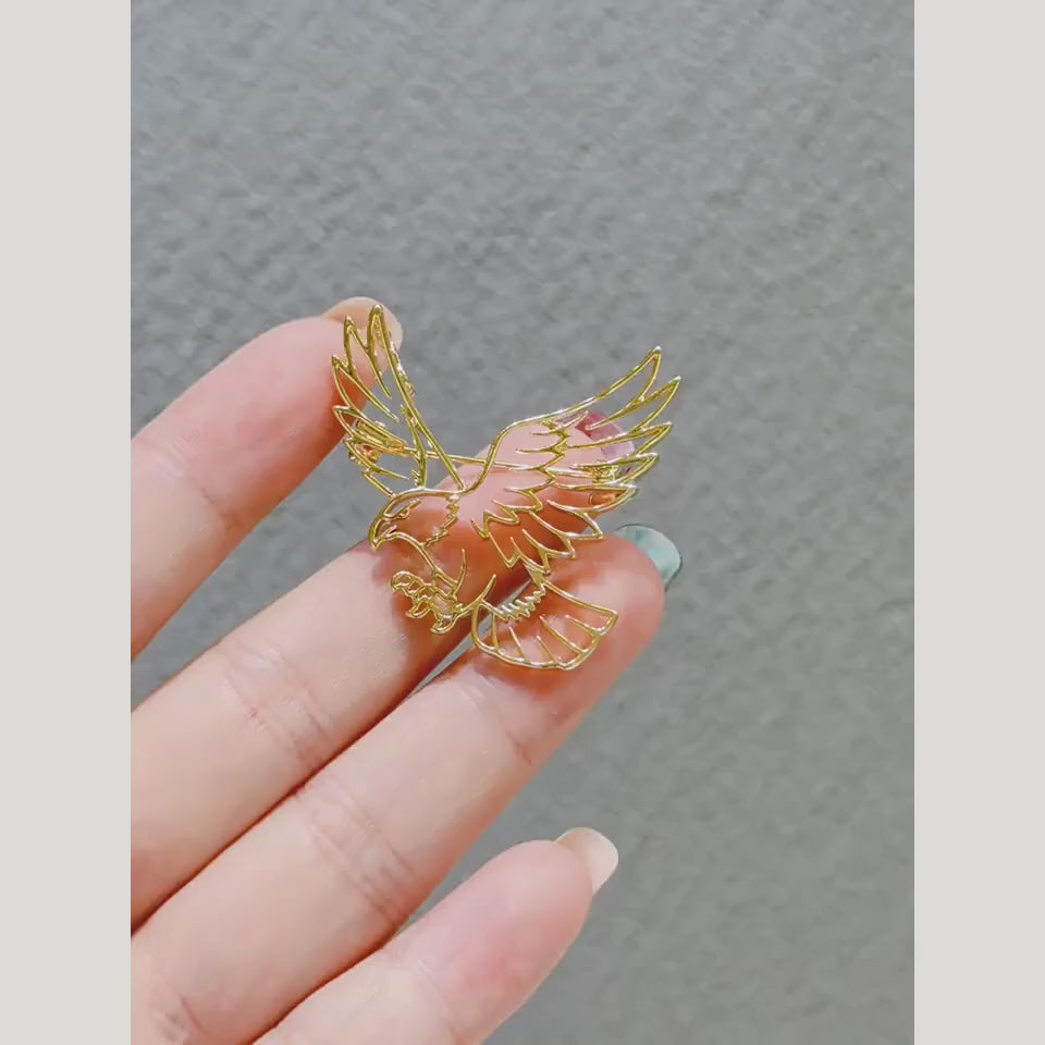Vinge openwork eagle brooch turning to show the raised wings and pin back