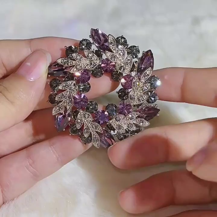 Product film showing the Purple and Green crystal leaf wreath brooches