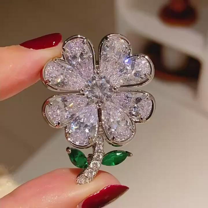 Aili Clear Zircon Clover Brooch in motion.