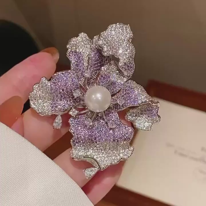 Silent detail film of Iiris Lavender Zircon Iris Brooch.