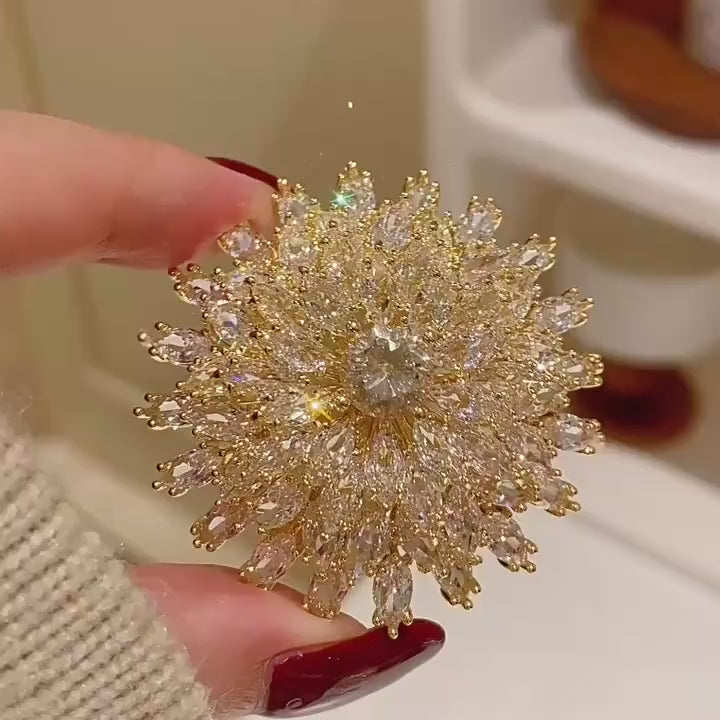 Lumi layered snowflake brooch in gold-tone and silver-tone finishes