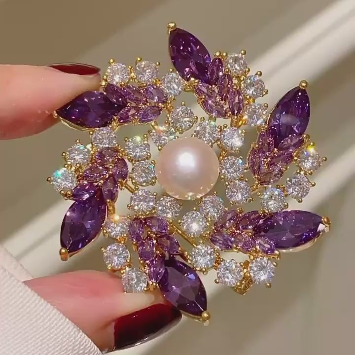 Iida Purple Zircon Pearl Flower Brooch in motion.