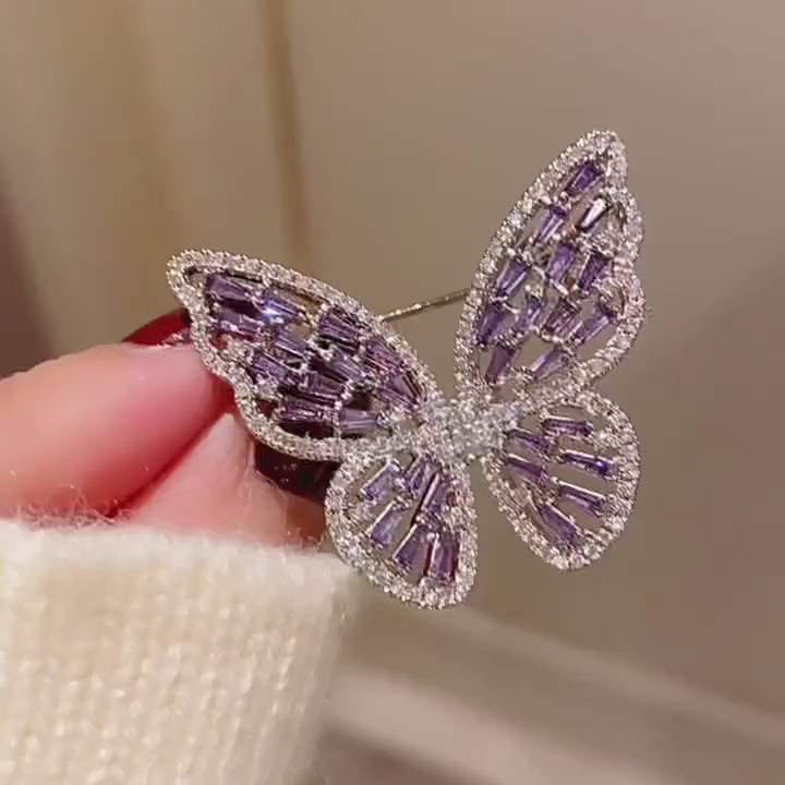Enni Baguette Zircon Butterfly Brooch in a silent product film. 