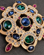 Ragna Multicolor Ornate Medallion Brooch — raised ornament and surface details, macro view