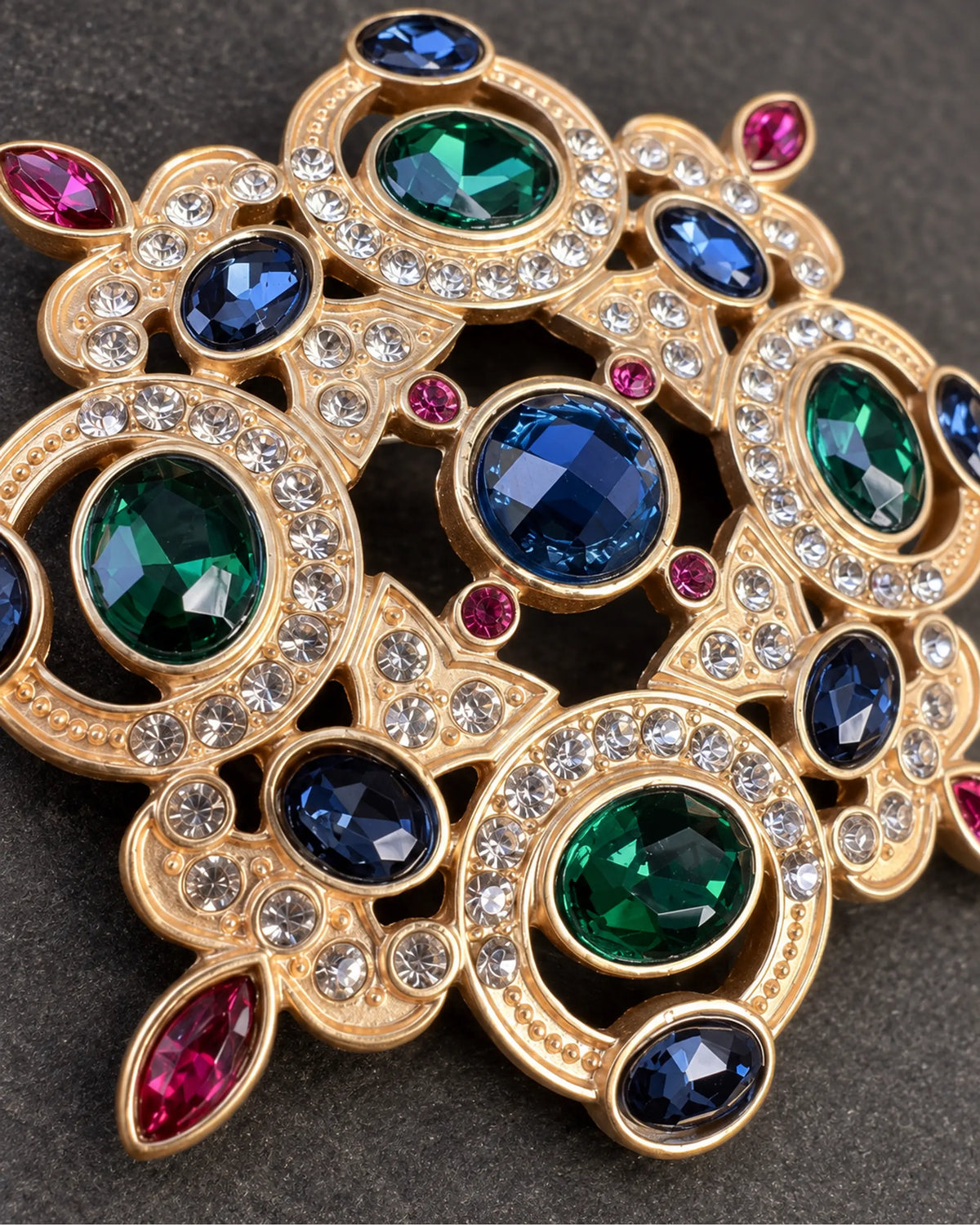 Ragna Multicolor Ornate Medallion Brooch — raised ornament and surface details, macro view