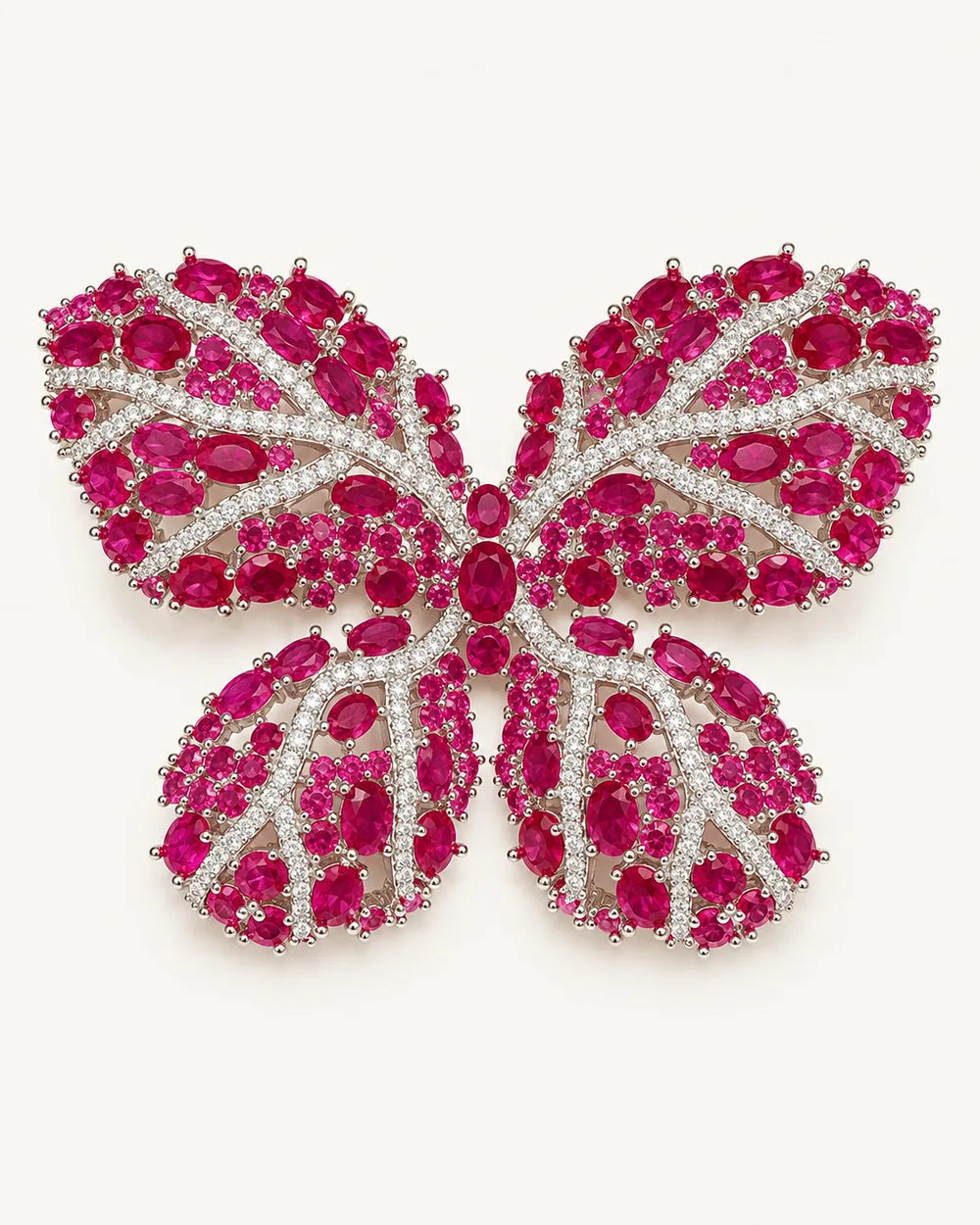 Raisa red synthetic corundum butterfly brooch with clear stone veins in a silver-tone copper setting