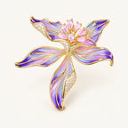 Riina flower brooch in Pink Violet, with pink zircon accents and iridescent violet enamel.