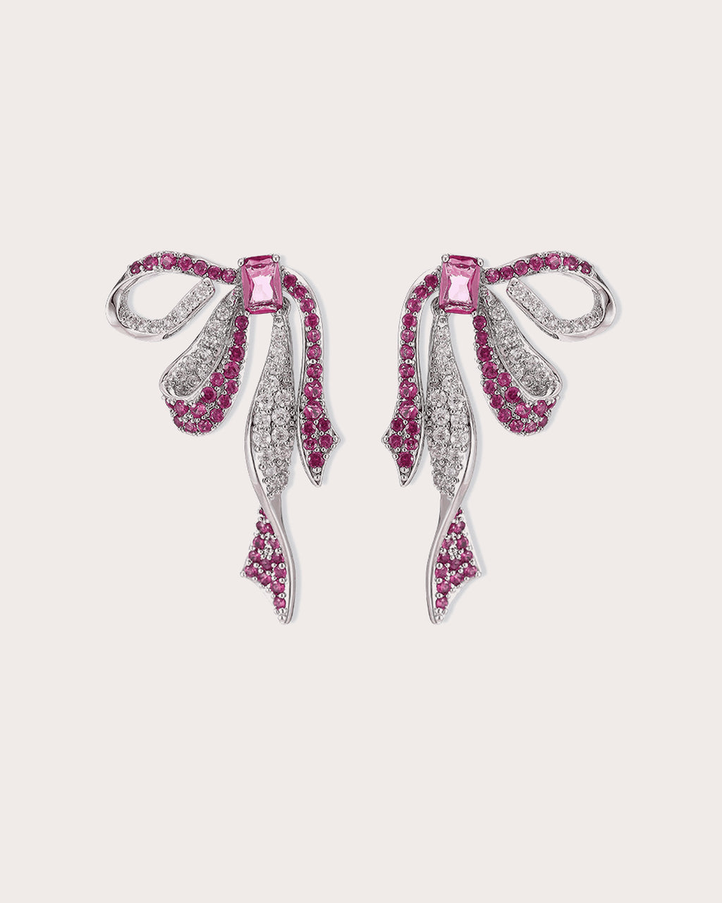 Runa Ribbon Bow Drop Earrings in White & Fuchsia on a soft blush background