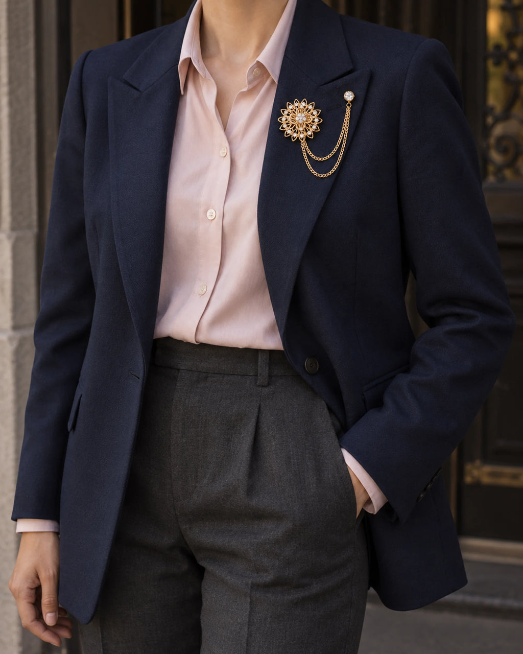 Ruusuke Filigree Flower Lapel Chain Brooch in gold-tone finish; wider faceless jacket styling