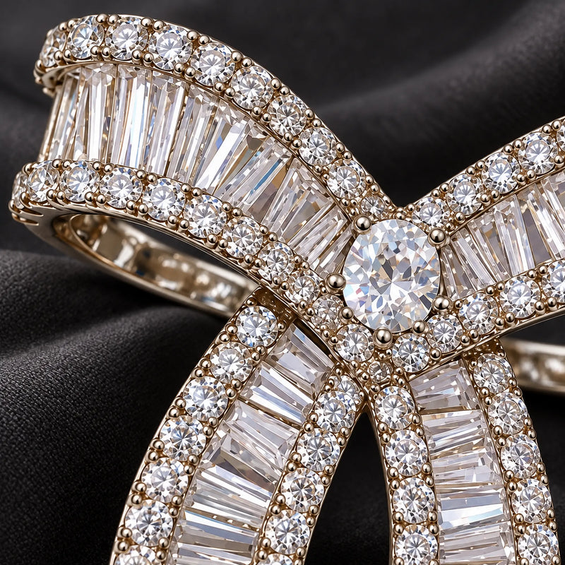 Baguette zircon rows meet round pavé borders around the oval centre.