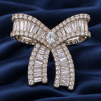 Salla Baguette Zircon Bow Brooch in an oblique front view showing raised settings and dimensional construction.
