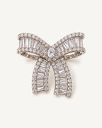 Salla Baguette Zircon Bow Brooch shown complete on a warm plain background.