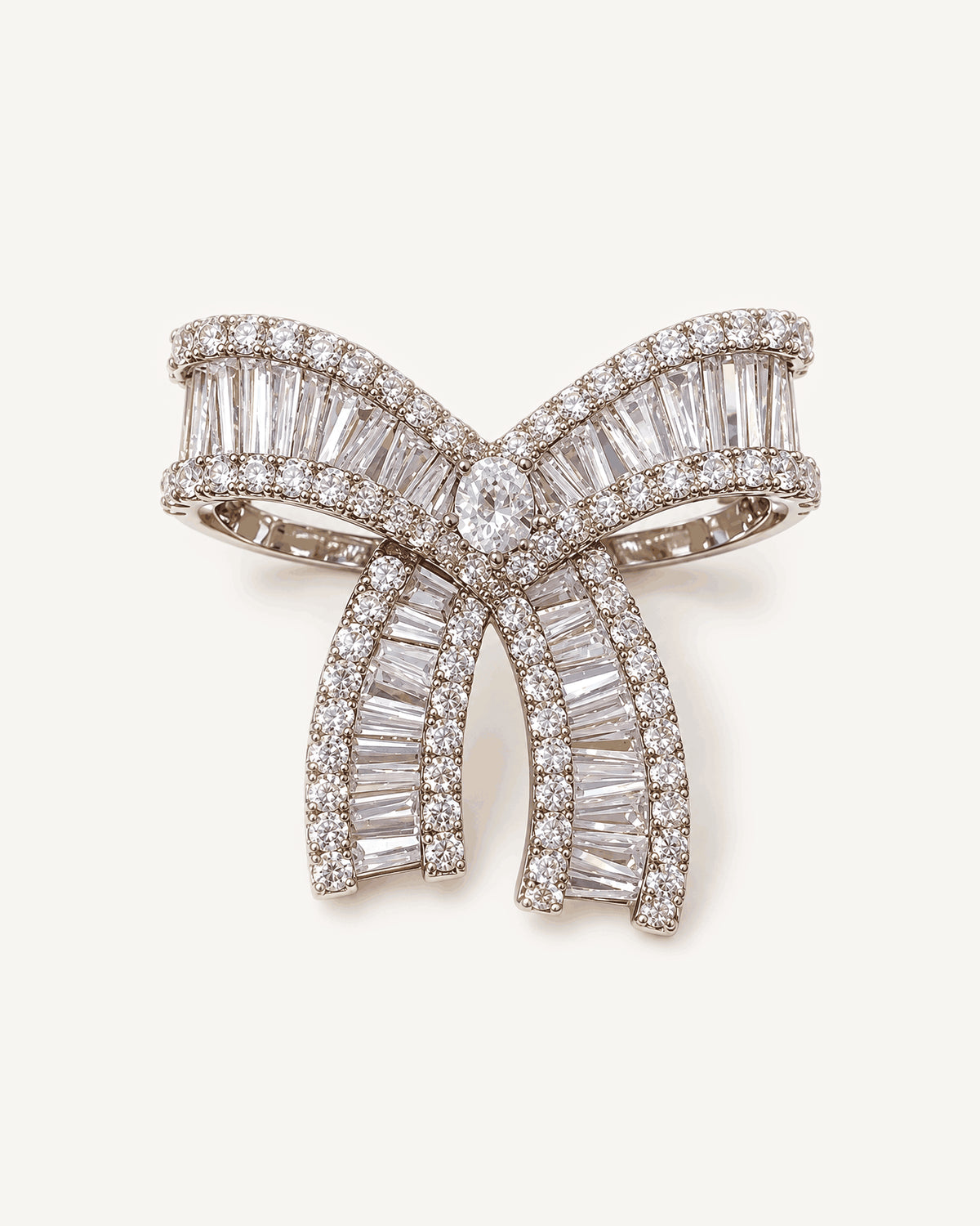 Salla Baguette Zircon Bow Brooch shown complete on a warm plain background.