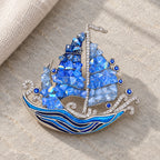 Seili Blue Sailboat Brooch — original product still life