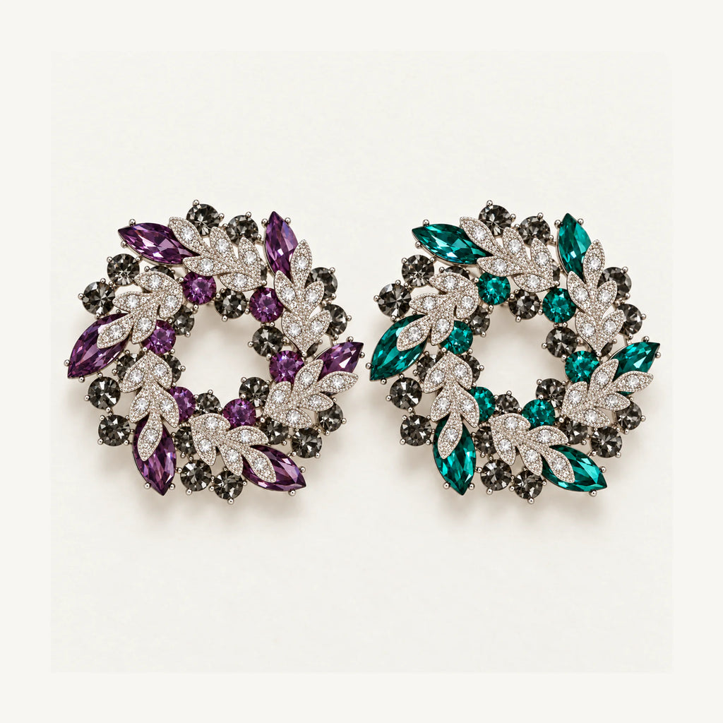 Purple and Green crystal leaf wreath brooches shown side by side at the same scale