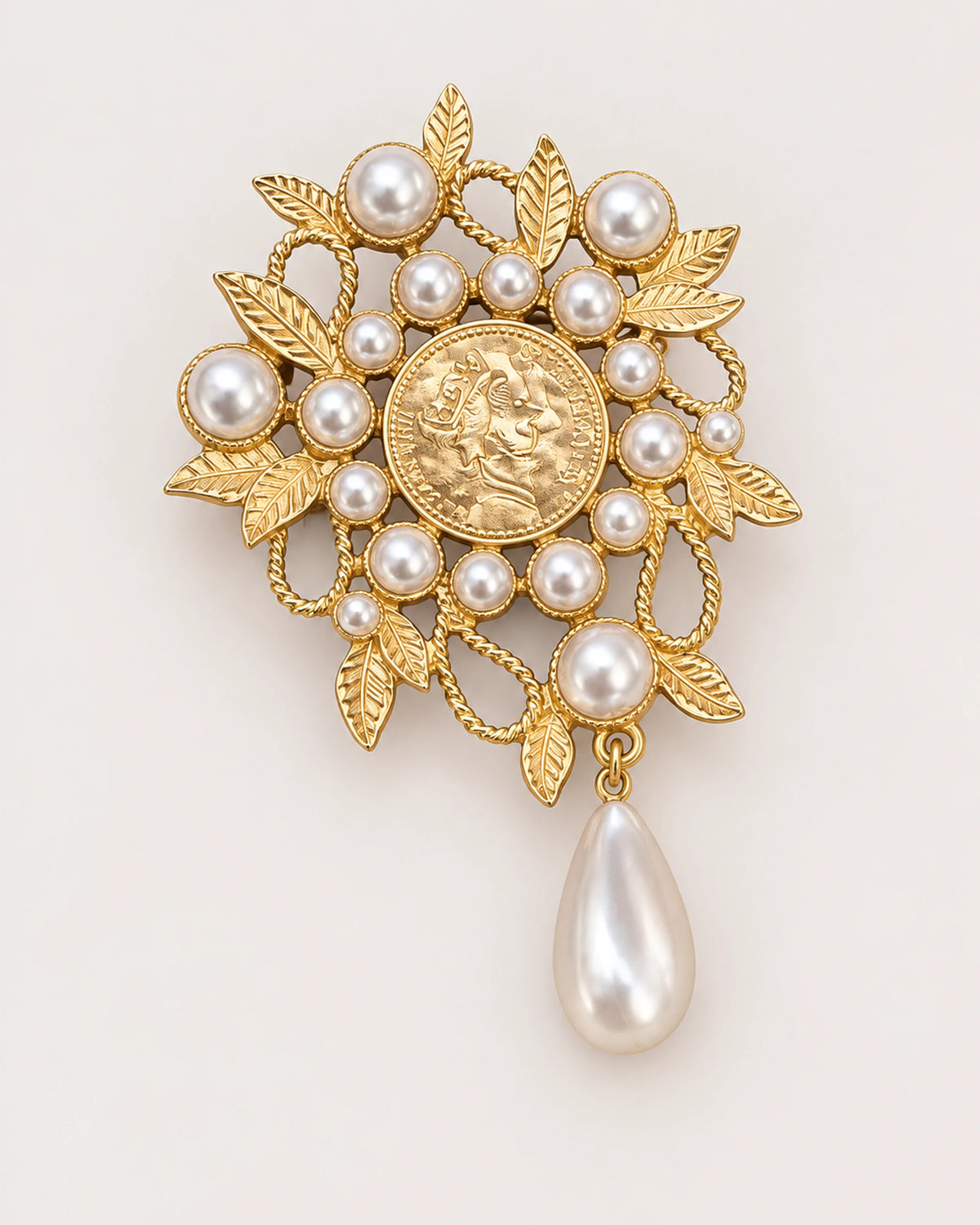 Signe Coin Medallion Drop Brooch in gold tone & white, front product view
