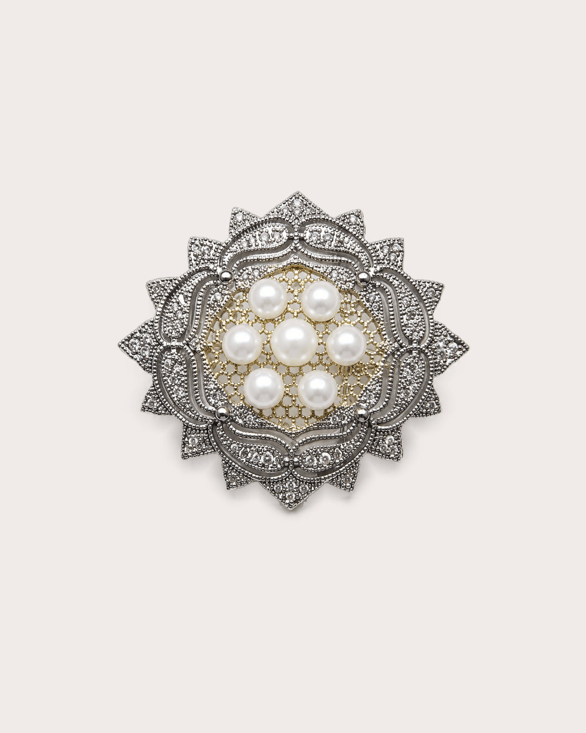 Front of Solveig Freshwater Pearl Rosette Brooch with seven pearls, silver-tone scrolls and a warm-toned center.