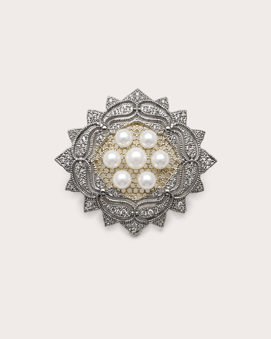 Front of Solveig Freshwater Pearl Rosette Brooch with seven pearls, silver-tone scrolls and a warm-toned center.