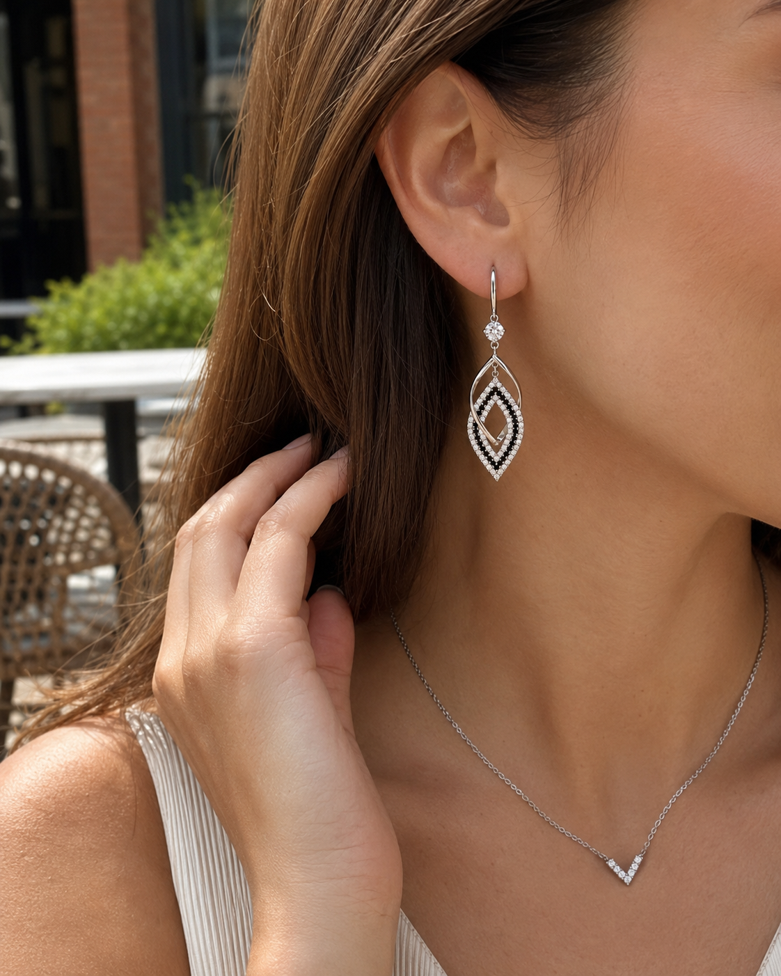 Close view of Tahti Crystal Drop Earrings with crystal and gold-tone finish