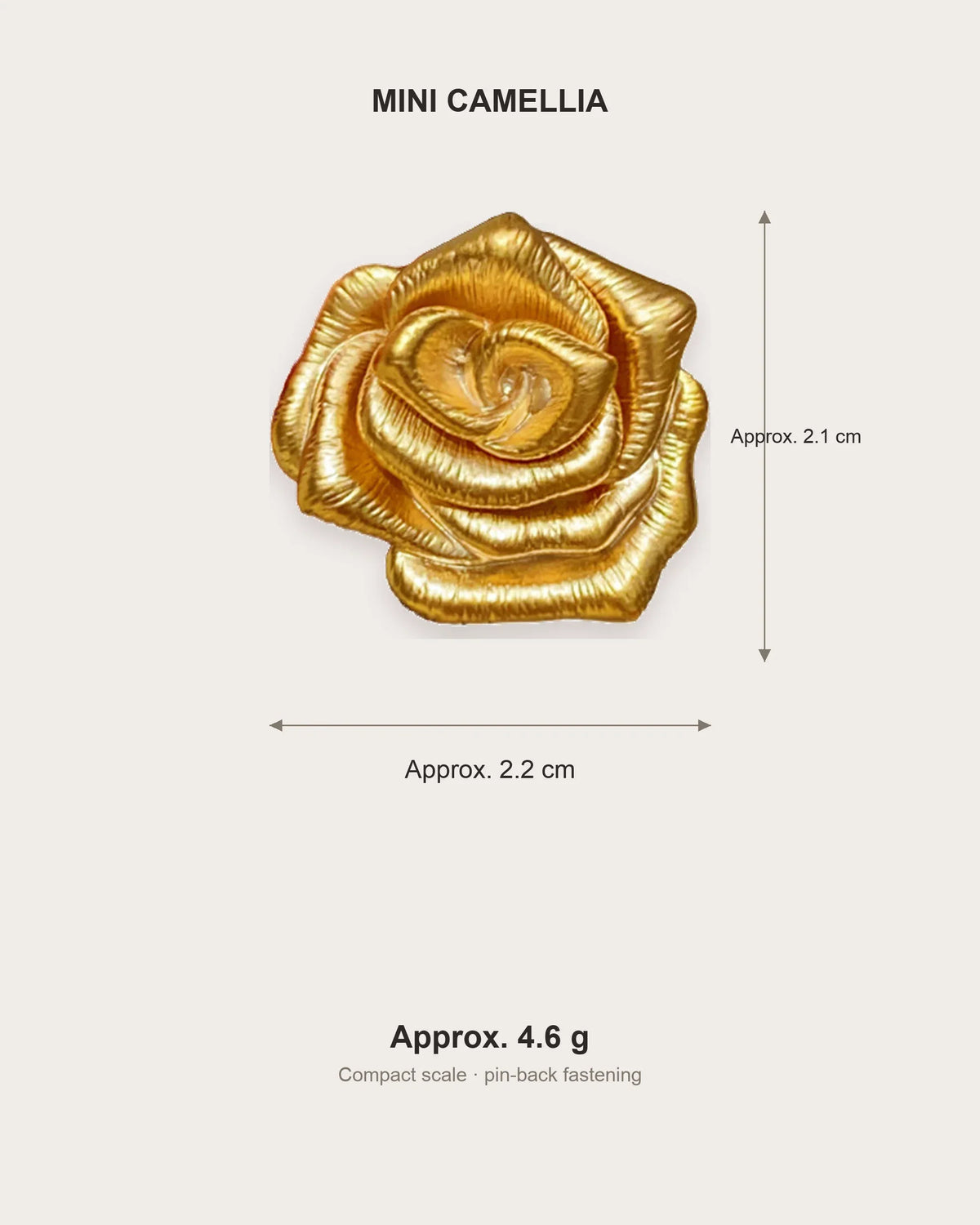 Taimi Mini Gold Camellia Brooch size guide showing 2.2 by 2.1 centimetres and a weight of 4.6 grams