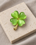 Tova Cat-Eye Clover Magnetic Brooch, Gold & Green, product still life