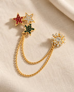 Tria Tricolor Star Lapel Chain Brooch in gold-tone finish; complete still-life drape