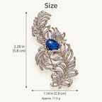 Tuire Blue-Centre Zircon Feather Brooch overall size: Approx. 2.28 × 1.14 in (5.8 × 2.9 cm); approximately 11.5 g.