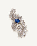 Tuire Blue-Centre Zircon Feather Brooch shown complete on a warm plain background.