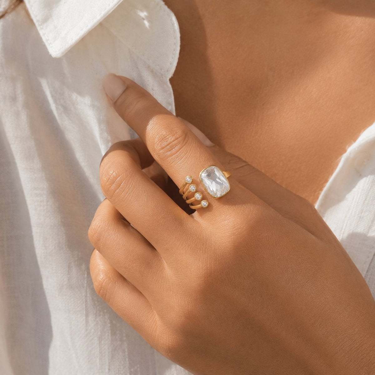 Gold adjustable crystal ring close-up wearing view