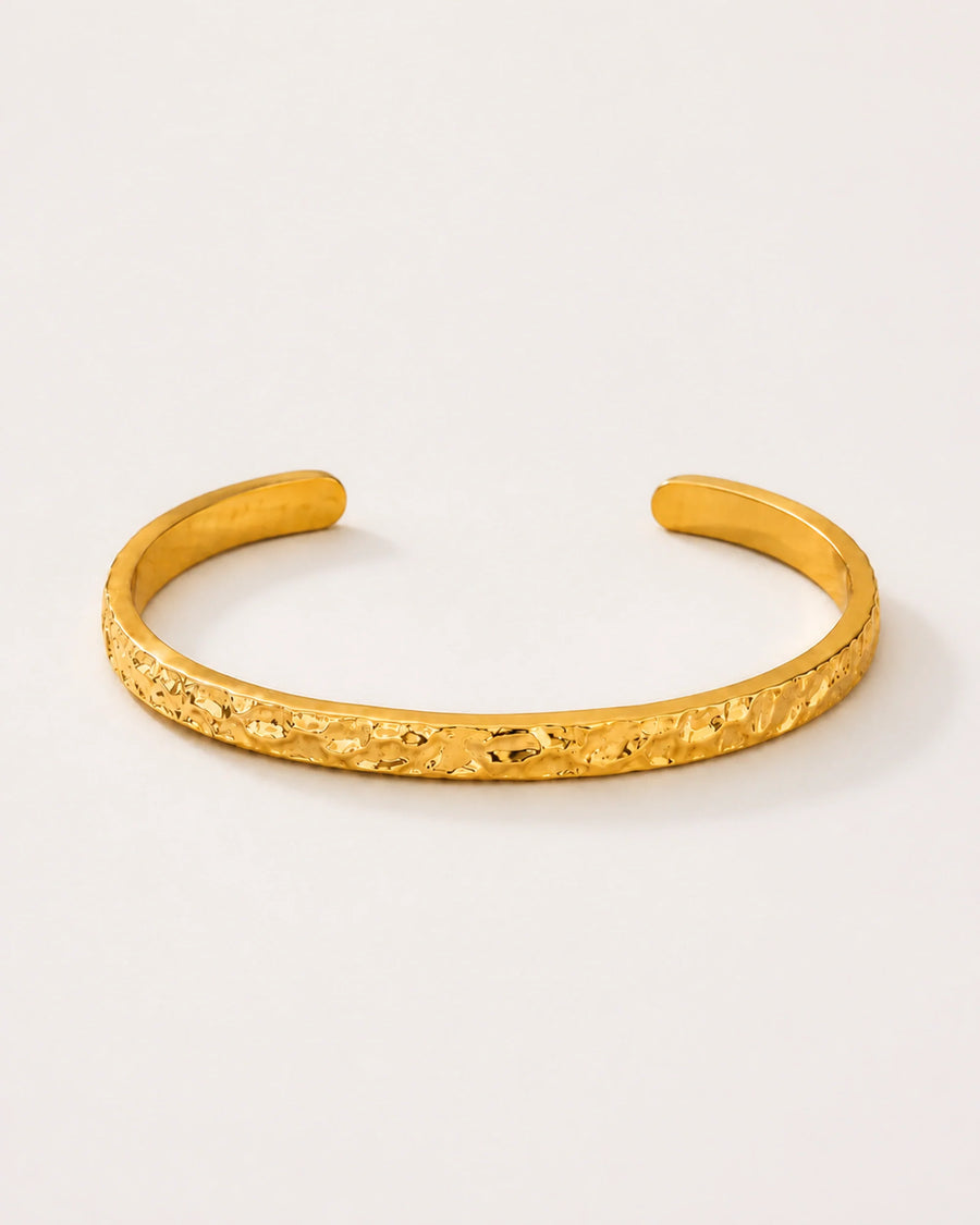 Auren Ridge Cuff Bracelet on a soft warm grey background