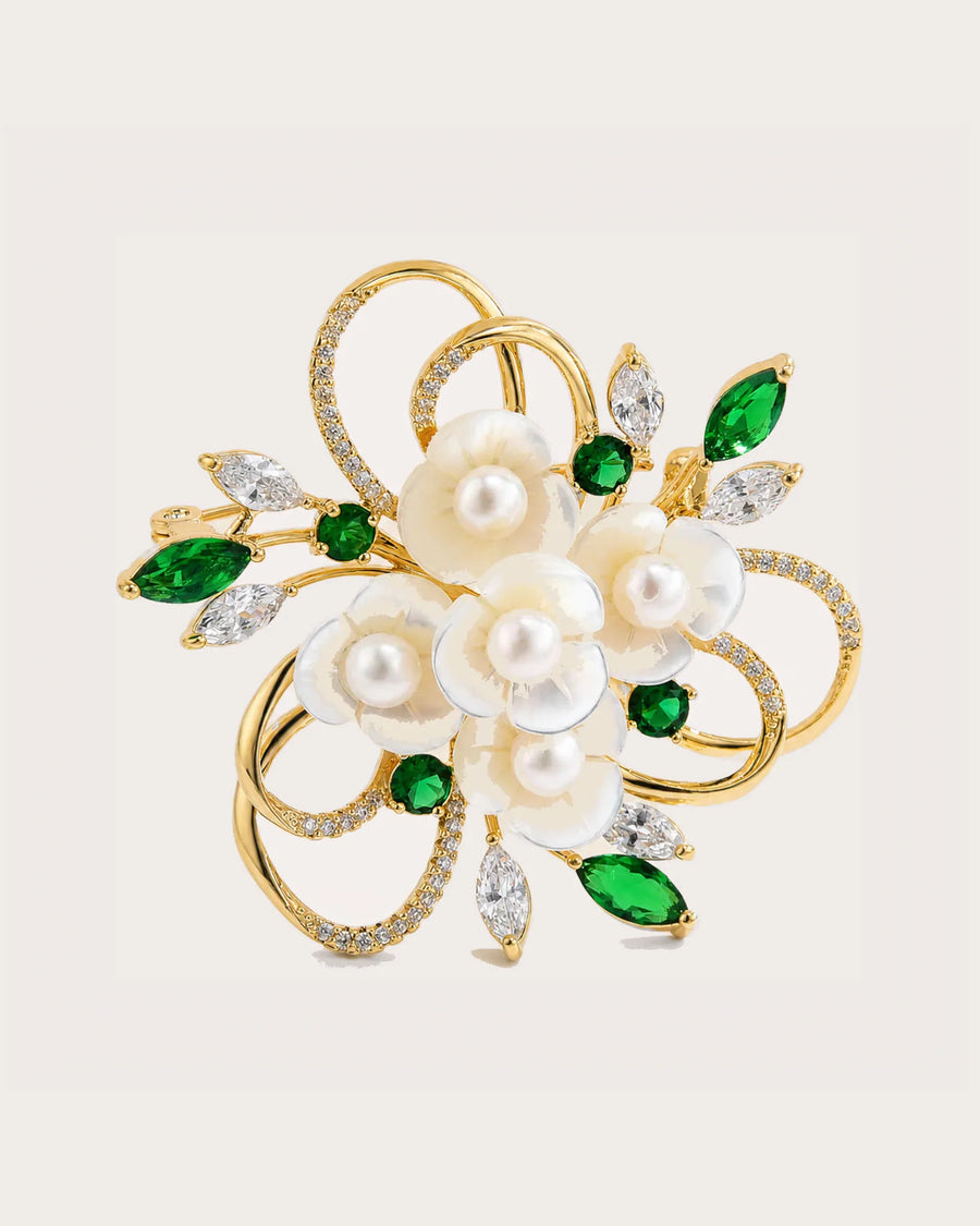Eira Pearl Garden Brooch on a soft warm grey background