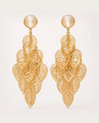 Lehti Gold Leaf Earrings on a soft warm grey background