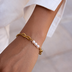 Helmi Pearl Heart Bracelet worn on wrist