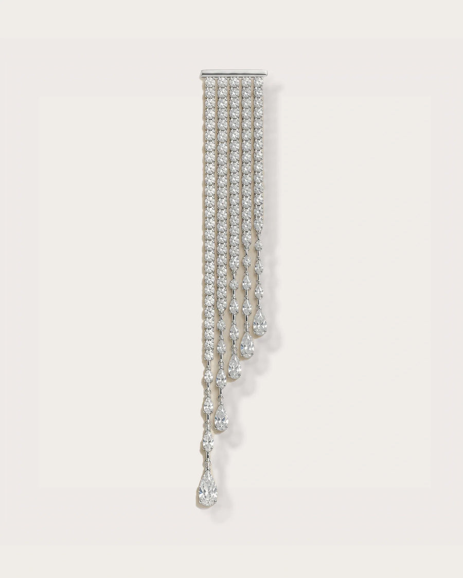 Kajo Crystal Cascade Brooch on a soft warm grey background