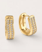 Kide Double-Row Crystal Huggie Earrings on a soft warm grey background