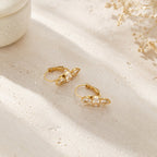 Gold crystal huggie earrings alternate angle