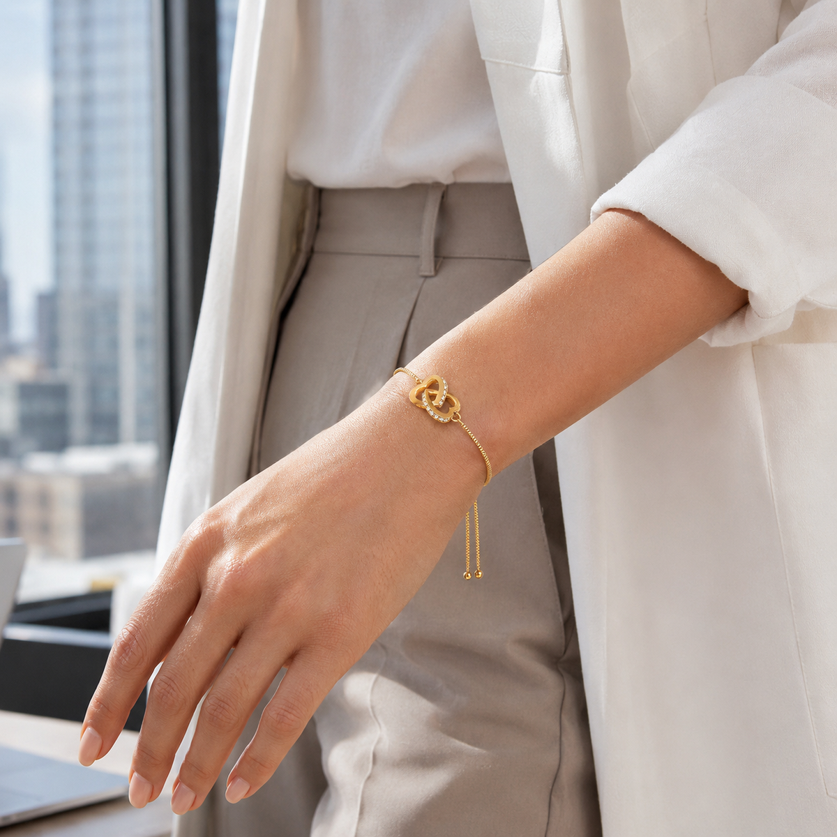 Lovi Heart Knot Bracelet worn on wrist