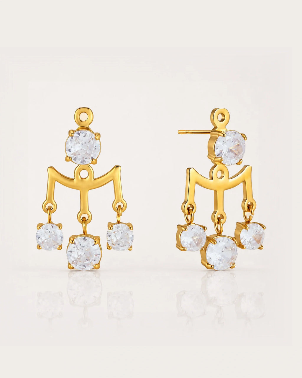 Mira Lantern Zircon Earrings on a soft warm grey background