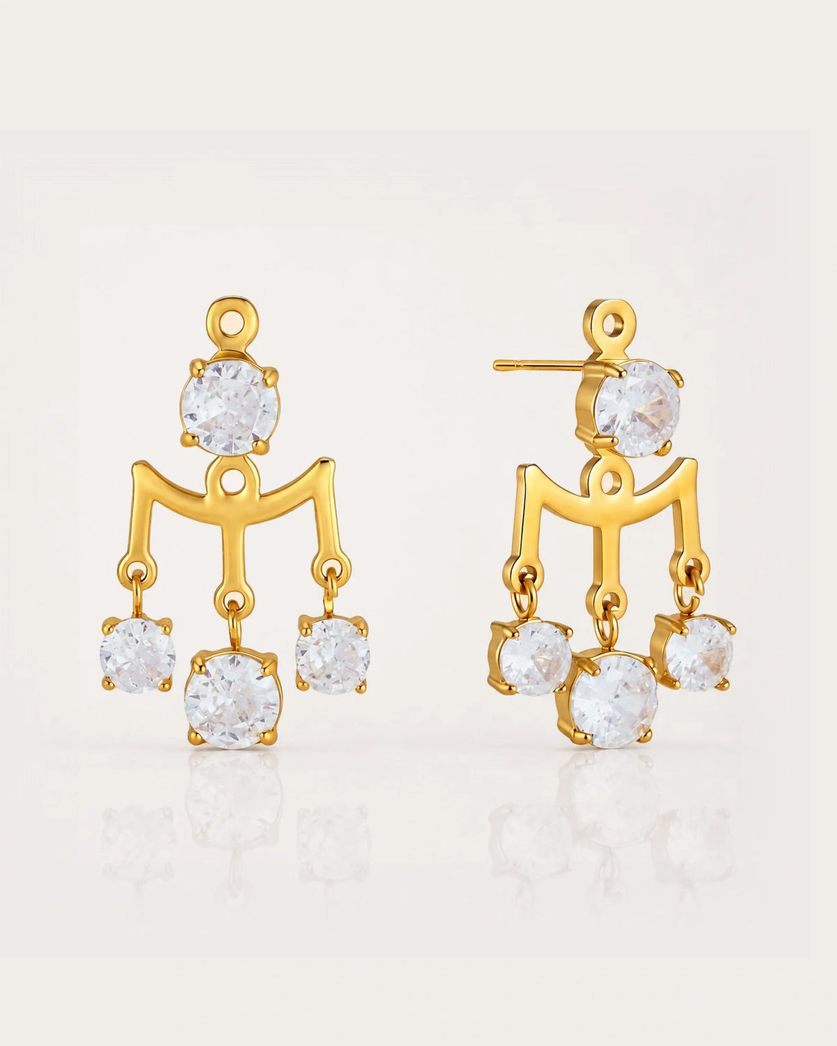 Mira Lantern Zircon Earrings on a soft warm grey background