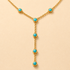Nocturne Eye Charm Necklace showing eye charm and polished warm finish